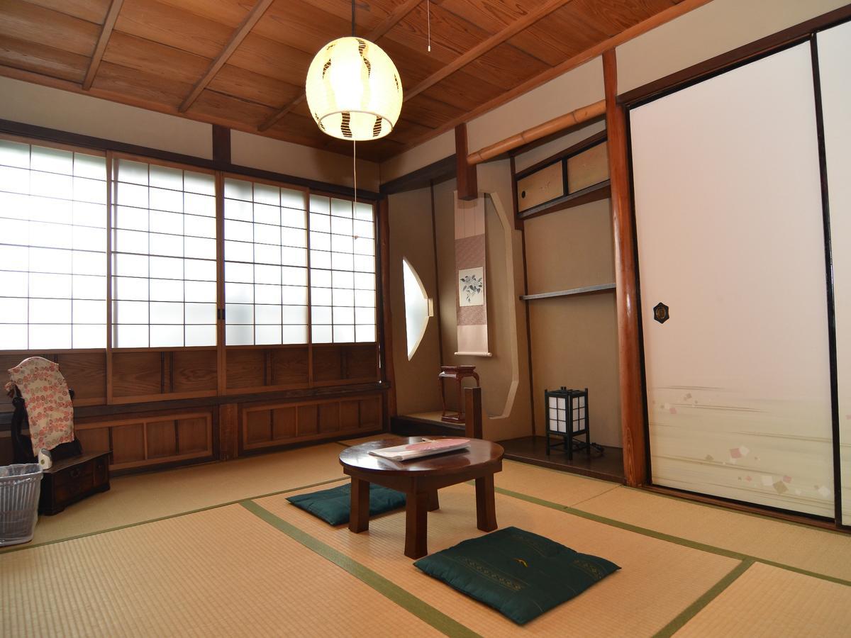 Guest House Rakuza Kioto Habitación foto